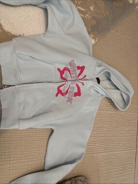 White Fox Light Blue Zip-Up Hoodie with Pink Graphic